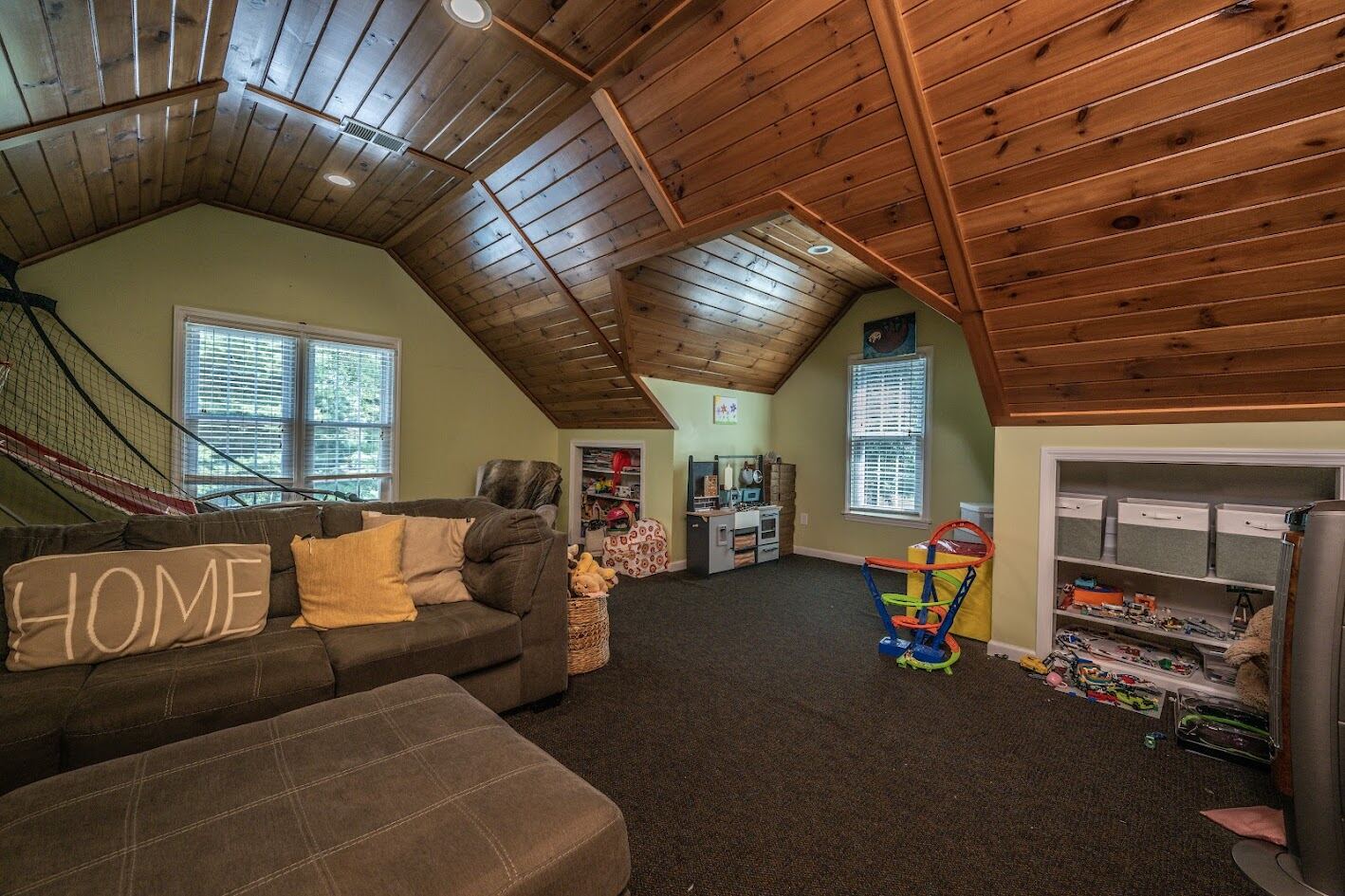 Large bonus room with a cedar-planked cathedral ceiling, recessed lighting, and built-in storage